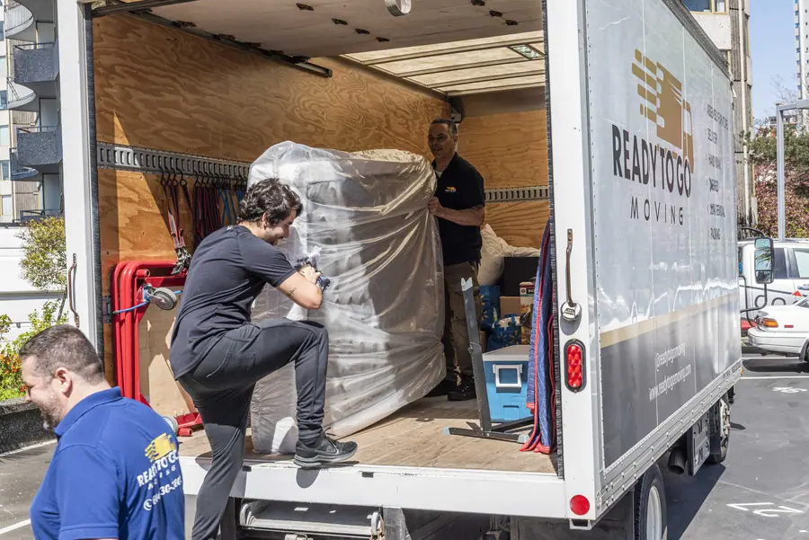 Crew loading the truck