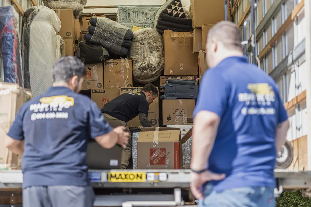 Ready To Go crew loading boxes into the truck